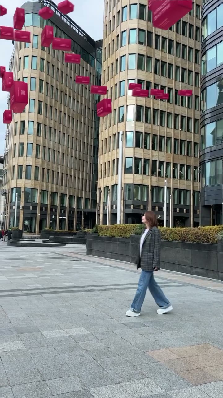 Large branded CG objects above the city