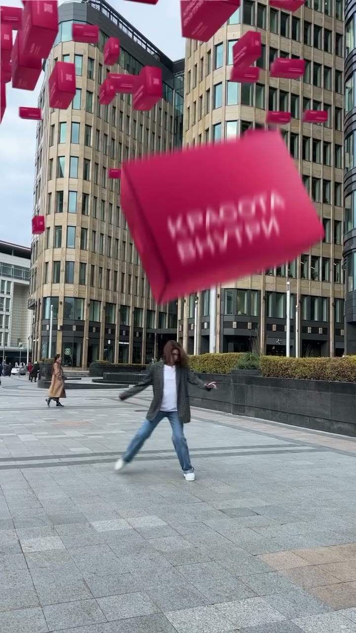 The hero interacts with a giant product in live-action